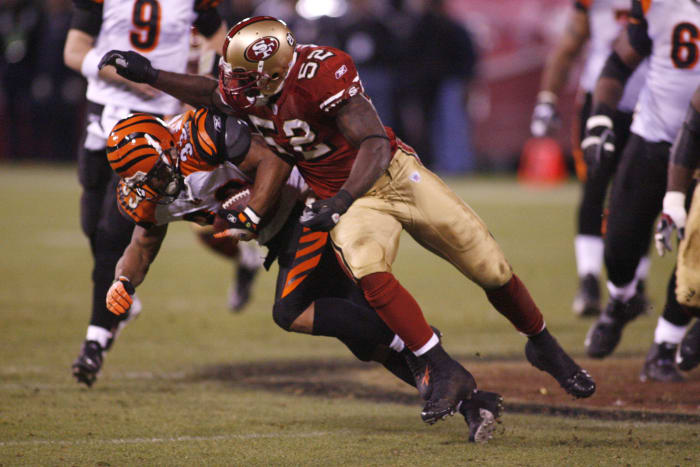 Dec 15, 2007; San Francisco, CA, USA; San Francisco 49ers linebacker Patrick Willis (52) delivers a hard hit against Cincinnati Bengals running back Kenny Watson (33) during the fourth quarter at Monster Park in San Francisco, CA. The San Francisco 49ers defeated the Cincinnati Bengals 20-13. Mandatory Credit: Cary Edmondson-USA TODAY Sports